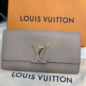 Louis Vuitton Gray Clutch with Silver Logo